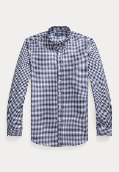 Hosszú ujjú kék-fehér kockás, gombolós ing, gombos gallérral és kis hímzett logóval a mellrészen.