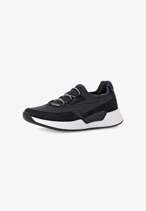 Black athletic sneaker featuring mixed materials, including smooth and suede textures, with silver laces and a white rubber sole.