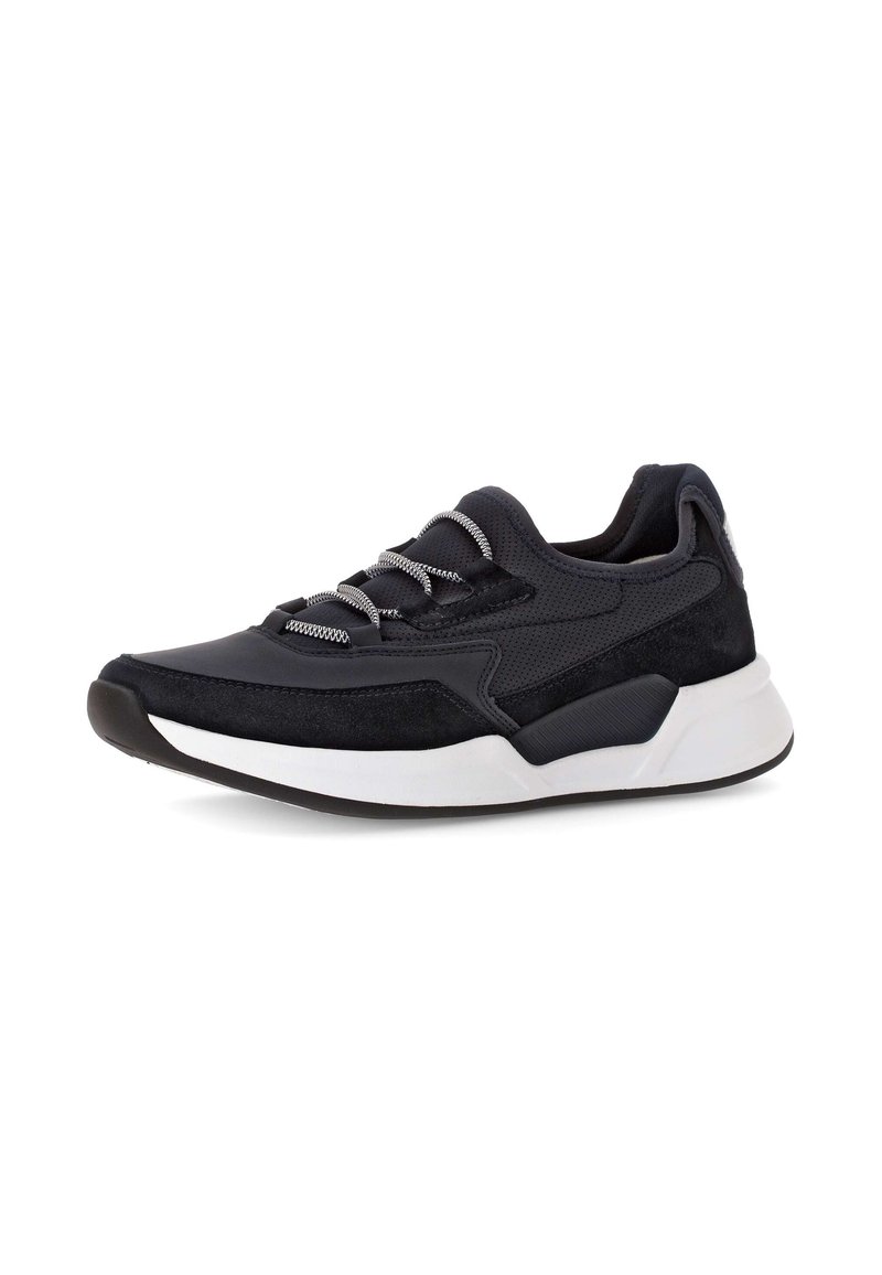 Black athletic sneaker featuring mixed materials, including smooth and suede textures, with silver laces and a white rubber sole.