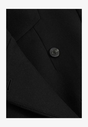 Schwarzer Wollblazer mit glatter Textur, scharfen Revers und einem glänzenden schwarzen Knopf mit vier Löchern.