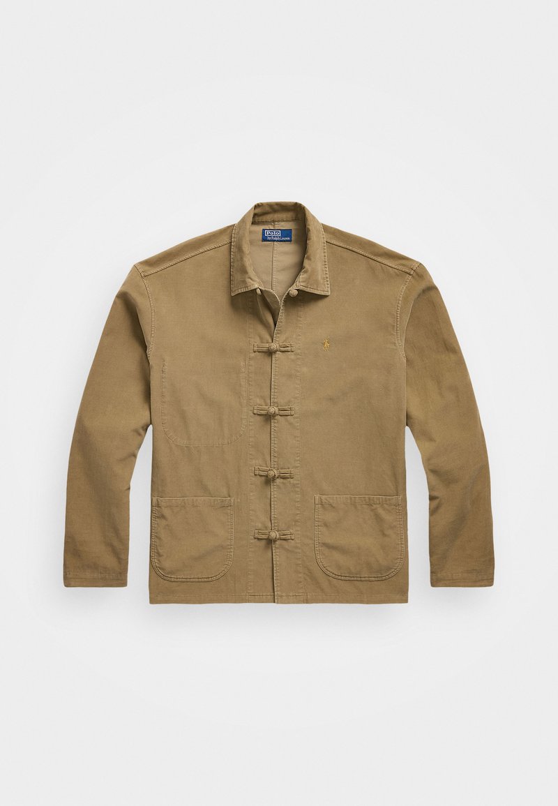 Tan bomullskavaj med mandarin-krage, framknäppning med togglar och två stora påsydda fickor framtill.