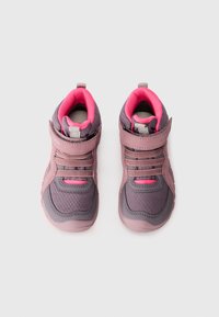 Purple and pink athletic shoes with a padded collar, mesh lining, Velcro strap, and rubber soles. Features textured overlays and a reinforced toe.