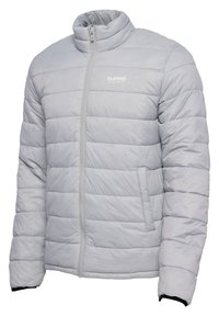 Veste matelassée gris clair avec fermeture éclair intégrale à l'avant, col montant, poches latérales et logo « hummel sportswear » sur la poitrine.