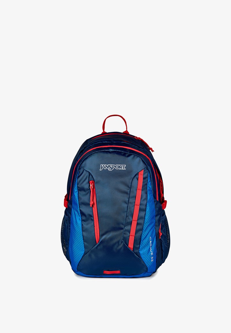 Sac à dos Jansport bleu marine et rouge avec plusieurs compartiments zippés et poches latérales en mesh, conçu pour un usage quotidien.