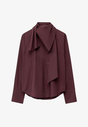 Burgundy long-sleeve shirt with draped scarf collar, button closure, and curved hem. Smooth fabric texture with tailored fit.