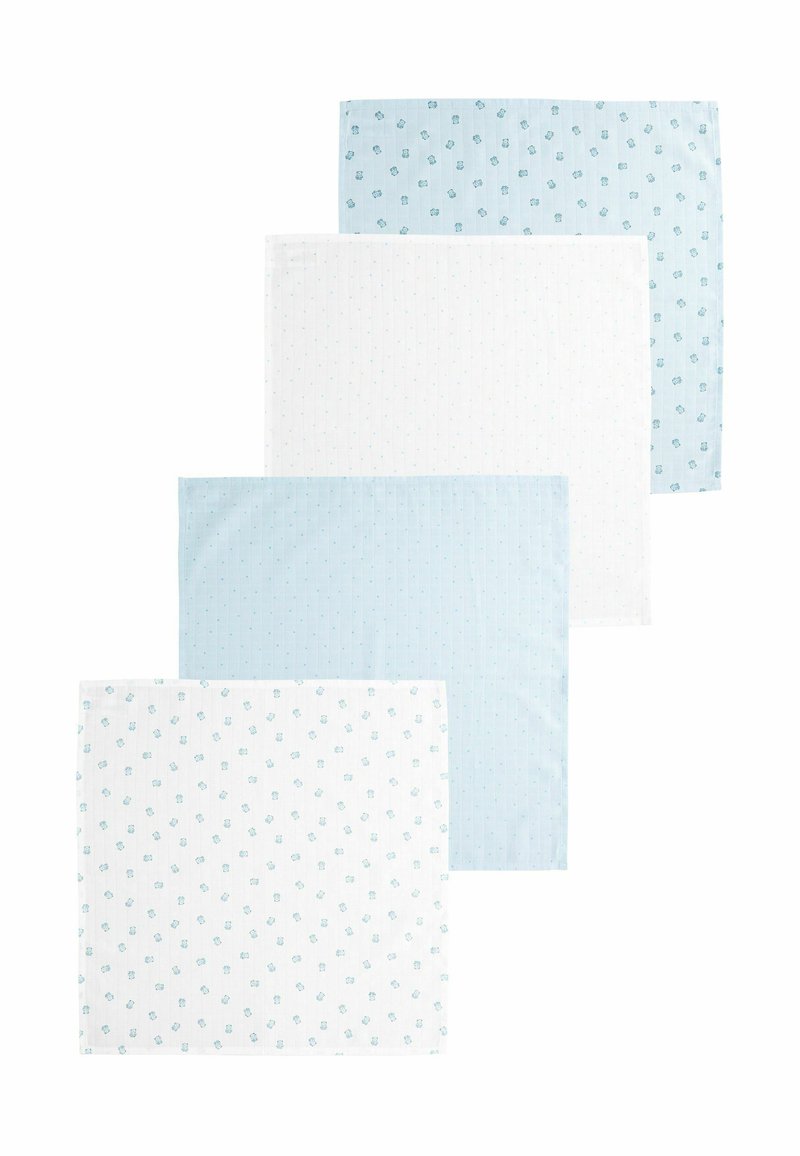 Four placemats: two light blue with patterns, one white with small blue dots, and one white with floral motifs. All have a smooth texture.