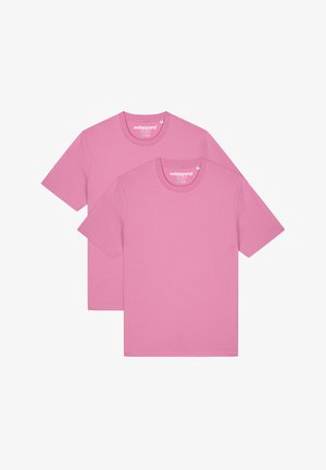 Pack de deux T-shirts en coton rose. Manches courtes, col rond, texture lisse et coutures régulières. Tissu léger adapté à une tenue décontractée.
