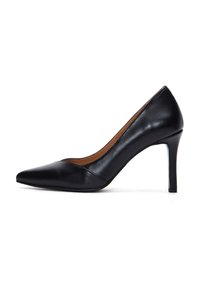 Black leather high heel pump with a pointed toe and a smooth texture. Features a slender heel and minimal detailing for a sleek design.