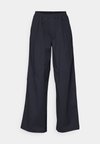 UNSTOPPABLE WOVEN - Trousers - black