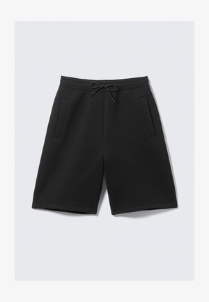 Zwarte sportshorts van zachte stof, met een elastische tailleband en een trekkoord, en twee voorzakken. Soepele textuur, knielange snit.