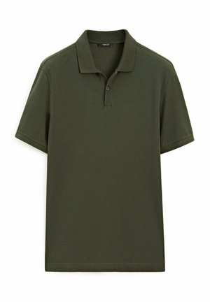 Dark green polo shirt made of cotton, featuring a classic collar, short sleeves, and a straight hem with no visible patterns or accents.