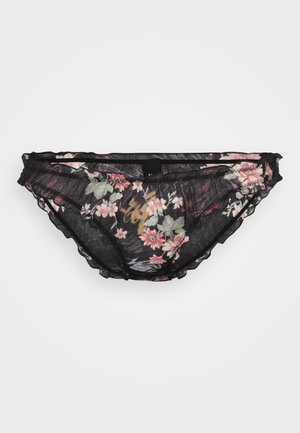 Culottes en dentelle florale noire avec des bords festonnés, présentant un motif floral multicolore sur un fond transparent et un petit logo.