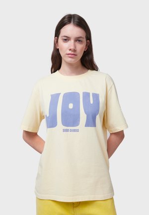 JOY - Print T-shirt - pale yellow