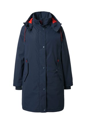 Parka bleu marine avec un col haut, des accents rouges, des boutons-pression et deux poches latérales. Fabriquée en matériau résistant à l'eau.