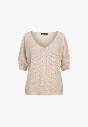 Ľahký sveter s výstrihom do V v svetlo béžovej farbe, otvoreným vzorom v tvare zigzag, krátkymi rukávmi a rebrovanými manžetami. Mäkká textúra.