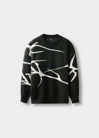 Suéter de punto negro con patrones abstractos en forma de ramas blancas, puños acanalados y cuello redondo, colocado plano sobre un fondo gris claro.