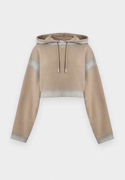 Μπεζ cropped φούτερ με μακριά μανίκια, ρυθμιζόμενα κορδόνια, διακριτική λεπτομέρεια με διαβάθμιση κοντά στις μανσέτες και μικρό κείμενο "OFF" κάτω από το λαιμό.