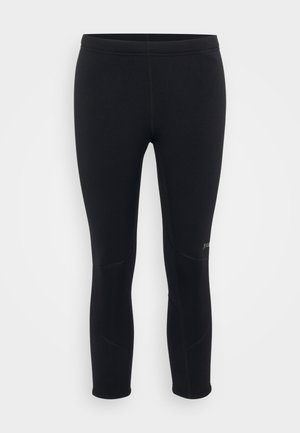 Svarta träningsleggings med en slät yta, åtsittande form och kontrasterande sömmar, med en logotyp på den nedre delen av benet och en medelhög midja.