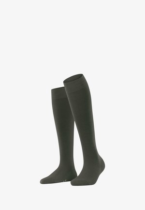 Calzini lunghi fino al ginocchio di colore verde scuro, realizzati in un tessuto liscio e elasticizzato, con un modello a coste texturizzato sulla parte superiore e punta senza cuciture.
