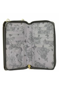 Ritsportemonnee in donkergroen. Het interieur heeft een lichtgrijze voering met zwarte bloempatronen, extra vakjes voor kaarten en een transparant ID-vak. Gouden hardware.