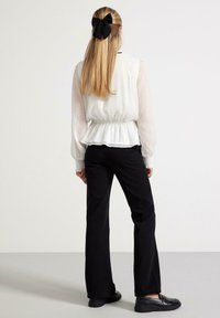 Lindex Pantaloni - black