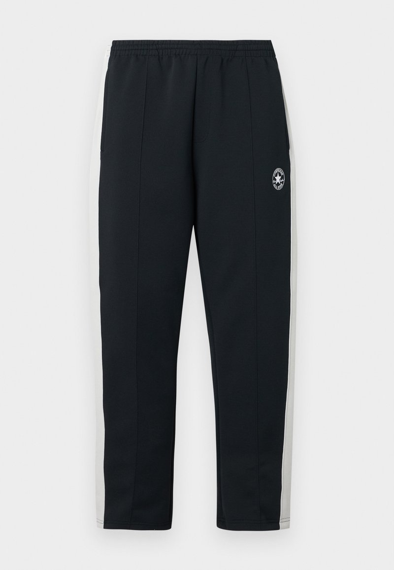 Sorte atletikbukser med elastisk talje, hvide sidestriber og et logo på venstre lår. Fremstillet af et blødt, glat materiale.