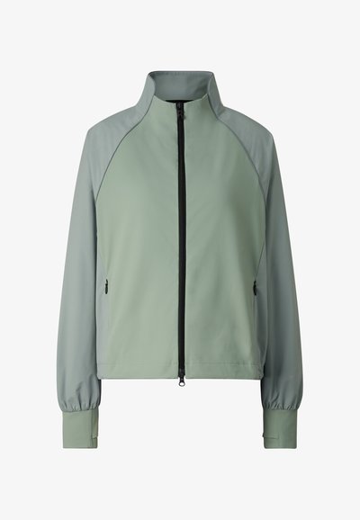 Lysegrøn sportjakke med lynlås, høj krave, lange raglanærmer, elastiske manchetter og lynlåslommer i siderne.