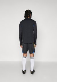 adidas Performance MANCHESTER UNITED TRAINING SHORTS - Športne kratke hlače - black/blue/tribe yellow