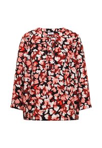 Blouse à manches longues avec motif floral abstrait rouge, rose, blanc et noir et un petit nœud au col rond.