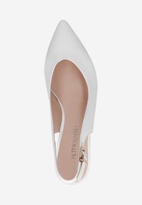 White leather pointed-toe slingback shoe with cutout sides, adjustable ankle strap, and subtle metallic branding on the insole.