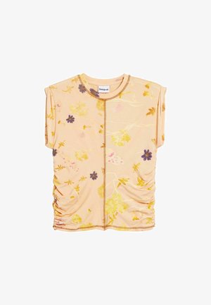 Lühikeste varrukatega persikavärvi topp, millel on kollaste ja lillade lillemustritega dekoratsioon. Omab külgmisi kokkupuuteid ja ringikujulist kaelust. Valmistatud pehmest materjalist.