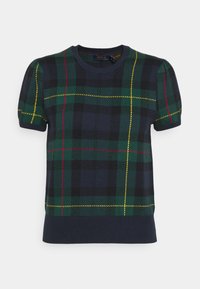 Suéter de manga corta en azul marino, con un patrón de cuadros verde y negro con detalles en rojo y amarillo; textura de punto, cuello y dobladillo acanalados.