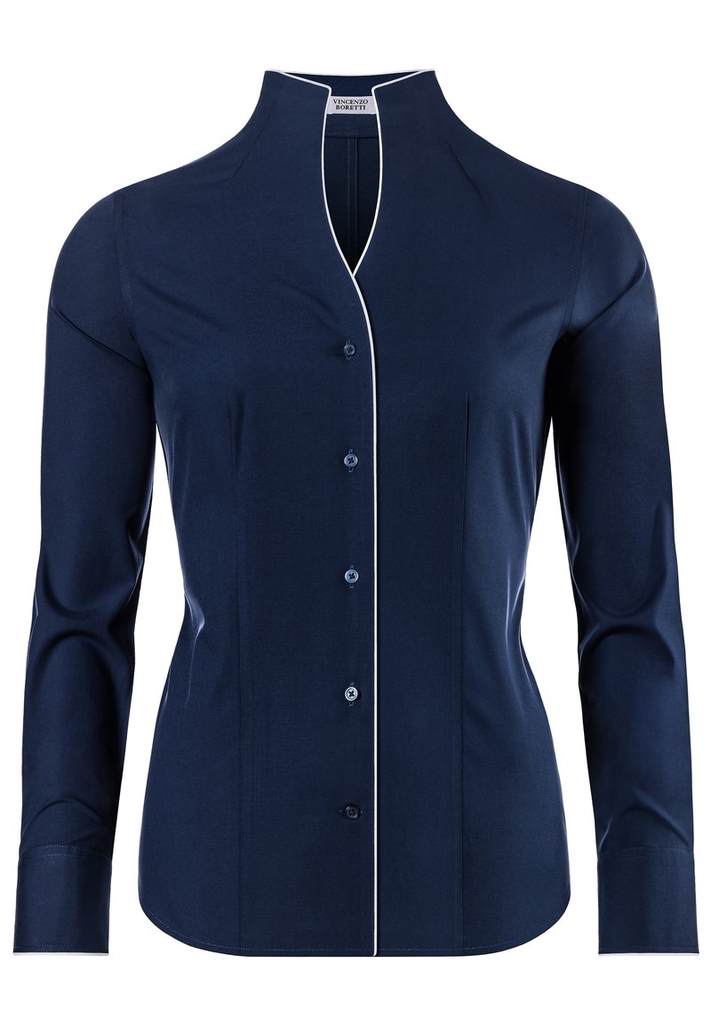 Chemise bleu marine à manches longues avec un col montant, fermeture à boutons sur le devant, détails en piping blanc le long du col et des poignets, et texture de tissu lisse.