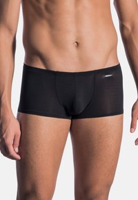 Black boxer briefs made of smooth fabric, featuring a fitted design, short legs, and a contoured pouch for comfort and support.