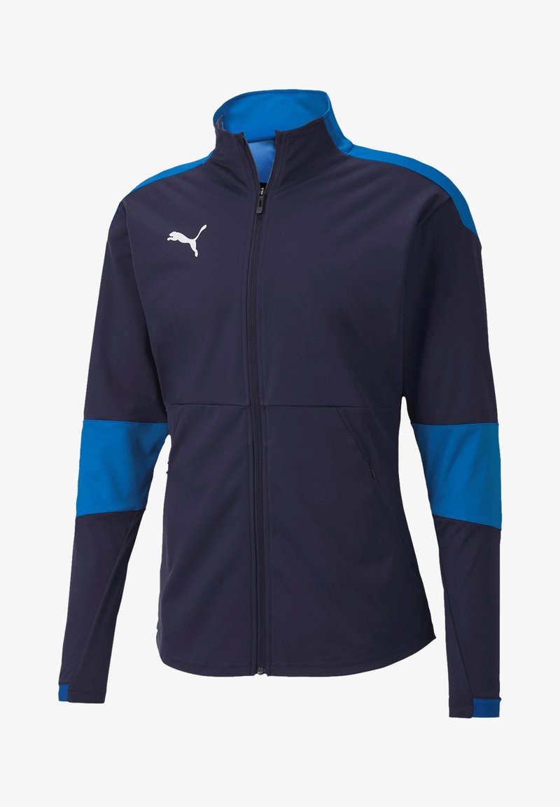 Marineblauwe sportjack met hoge kraag, volledige ritssluiting en blauwe zijpanelen. Beschikt over een wit logo op de borst en een gestructureerde stof.