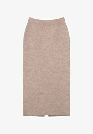 Jupe midi tricotée beige avec une taille haute, texture lisse et fente au dos pour faciliter les mouvements. Design simple sans matériel visible ni motifs.