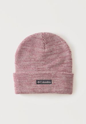 Bonnet tricoté violet et blanc avec revers plié et étiquette noire de la marque Columbia sur l'avant, sur fond blanc.