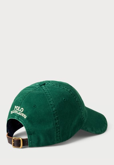 Zöld pamut baseball sapka, krémszínű hímzett "POLO RALPH LAUREN" felirattal. Barna bőrből készült állítható csattal rendelkezik.
