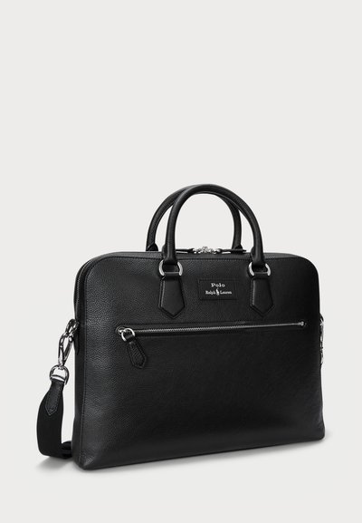 Black leather briefcase with two top handles, zippered front pocket, and a detachable shoulder strap. Features silver hardware and textured finish.
