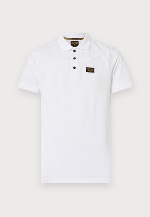 Polo shirt bianco realizzato in cotone testurizzato, con colletto a tre bottoni, maniche corte e un'etichetta logo nera sul petto.