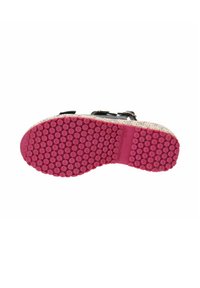 Calzature nere con una suola bianca lavorata e un fissaggio esagonale di colore rosa vivace. Presentano fibbie regolabili.