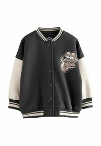 Zwarte en crèmekleurige varsityjack met gestreepte geribbelde kraag en manchetten. Bevat een opvallend luipaardprint Rolling Stones tonglogo.
