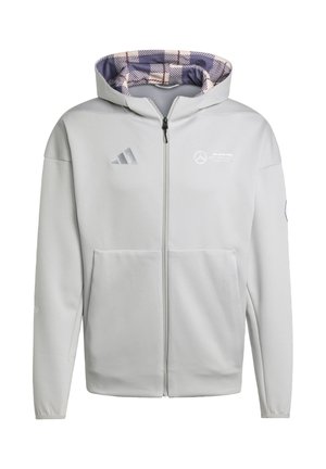 Light gray zip-up hoodie with a patterned purple and cream interior. Features adidas and Mercedes logos on the chest, and a front pocket.