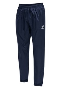 Marinblå vindjacka byxor med elastisk midja, avsmalnande anklar och logotypdetaljer. Tillverkade av lätt, mjukt material för komfort.