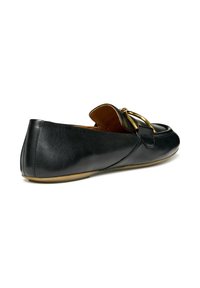 Sorte skinnloafers med gullfargede detaljer, glatt tekstur, rund tå og en lavprofil gummisåle.