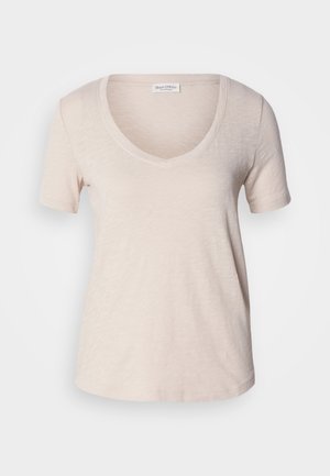 Short-sleeve V-neck t-shirt in light beige, made of soft, textured fabric. Slightly loose fit with a smooth hem. Marc O'Polo label visible.