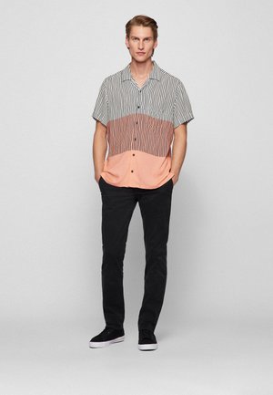 Pantalones chinos - black