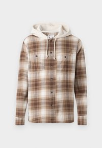 Chemise à carreaux marron et crème avec capuche, dotée de deux poches poitrine et de cordons de serrage. Tissu doux avec une texture lisse.