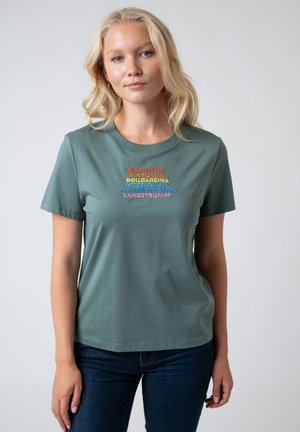 Green cotton t-shirt with short sleeves, featuring colorful embroidered text in various fonts across the chest. Simple round neckline.