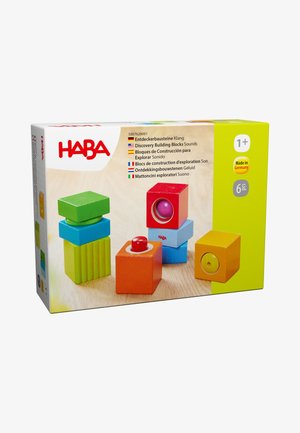 Colorful wooden sound discovery building blocks in green, blue, red, orange, and yellow, designed for children aged 1 and up.